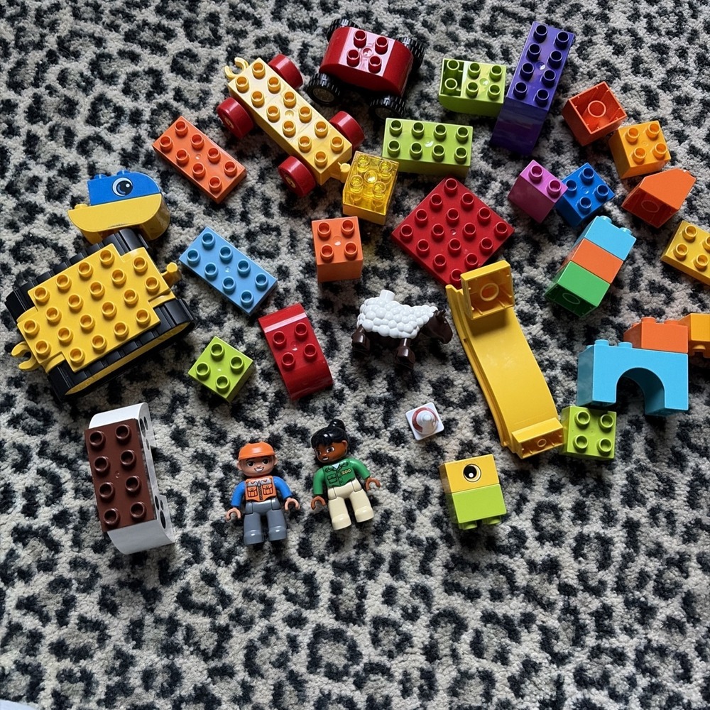 Assorted Lot Of Over 35 Diplo Lego Items Including People Construction Items +